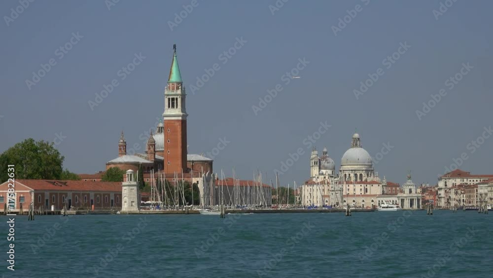 View of San Giorgio Maggiore church and Basilica Santa Maria della Salute in Venice from boat, Italy, 4k
View of San Giorgio Maggiore church and Basilica Santa Maria della Salute in Venice from boat, Italy, 4k