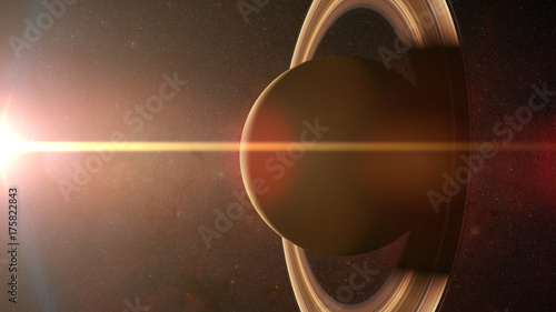 Fototapeta Naklejka Na Ścianę i Meble -  golden sunrise over the planet Saturn