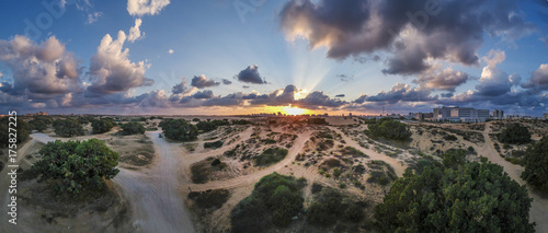 Panoramic view of sand dunes photo