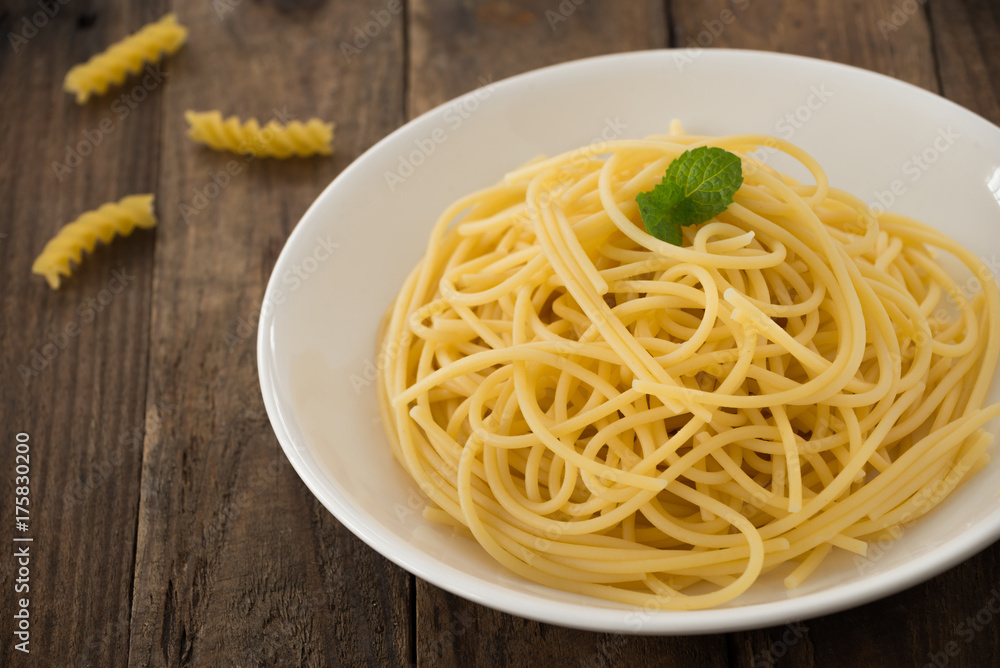 spaghetti on white plate