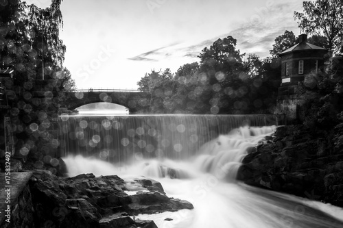 Water drops from waterfal are covering the lens photo