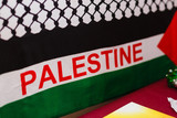 Realistic flag of palestine on the wavy surface of fabric this flag can be used in design