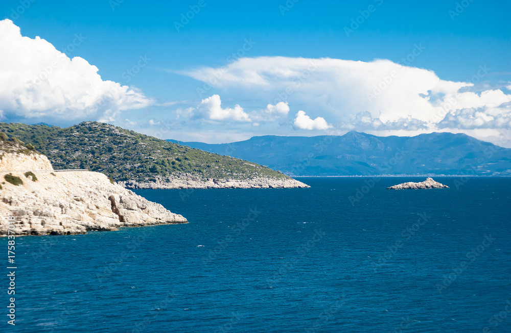 An empty Rocky coast and an island in the Mediterranean Sea not far from the town of Finike. Turkey