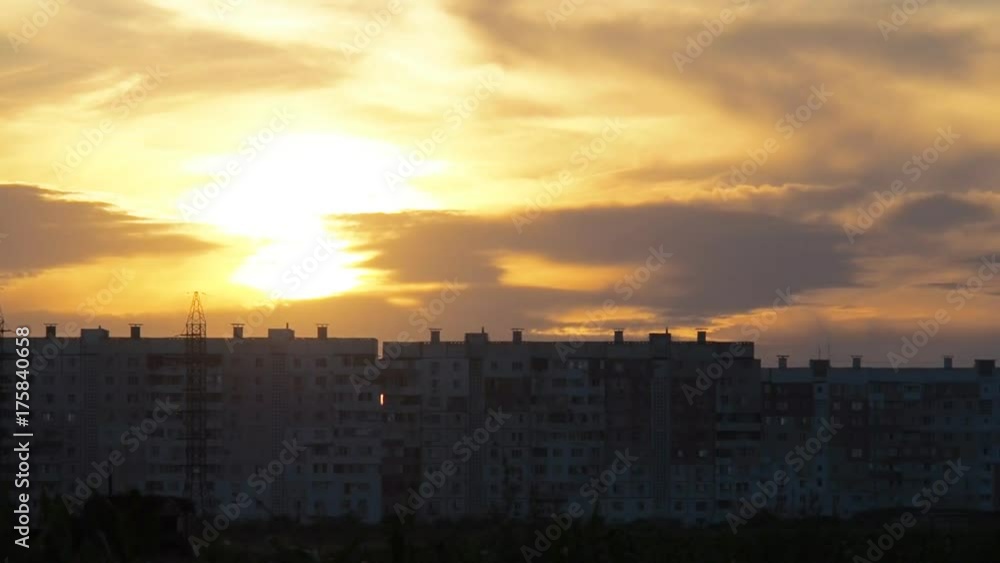 Sunset on the background of the city. City landscape on a sunset background. Sunset on the background of the city. City landscape on a sunset background.