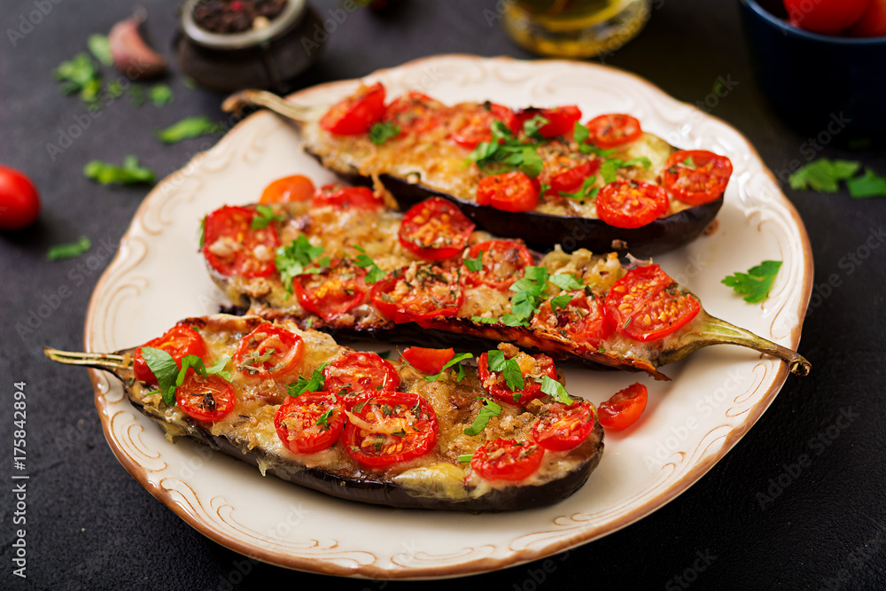 Baked eggplants with mozzarella and tomatoes with Italian herbs Baked eggplants with mozzarella and tomatoes with Italian herbs