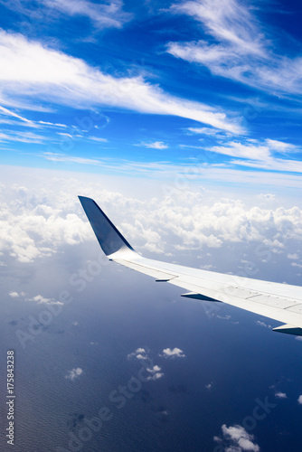 view of the wing of an airplane through the window