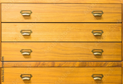 Front view of a vintage chest of drawers  an old piece of family furniture