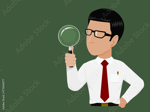 Businessman is holding the magnifying glass
