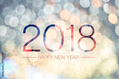 Happy new year 2018 with pale yellow bokeh light sparkling background,Holiday greeting card