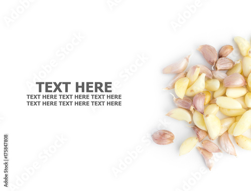 Fresh organic garlic cloves isolated on white background