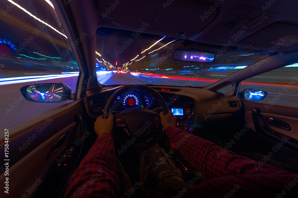Movement of the car at night at a speed view from the interior, Brilliant road with lights with a car at high speed Movement of the car at night at a speed view from the interior, Brilliant road with lights with a car at high speed