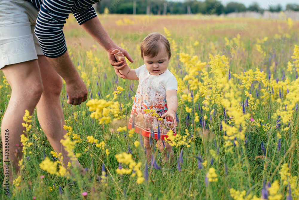 happy father with little daughter in the park, summer outdoors happy father with little daughter in the park, summer outdoors