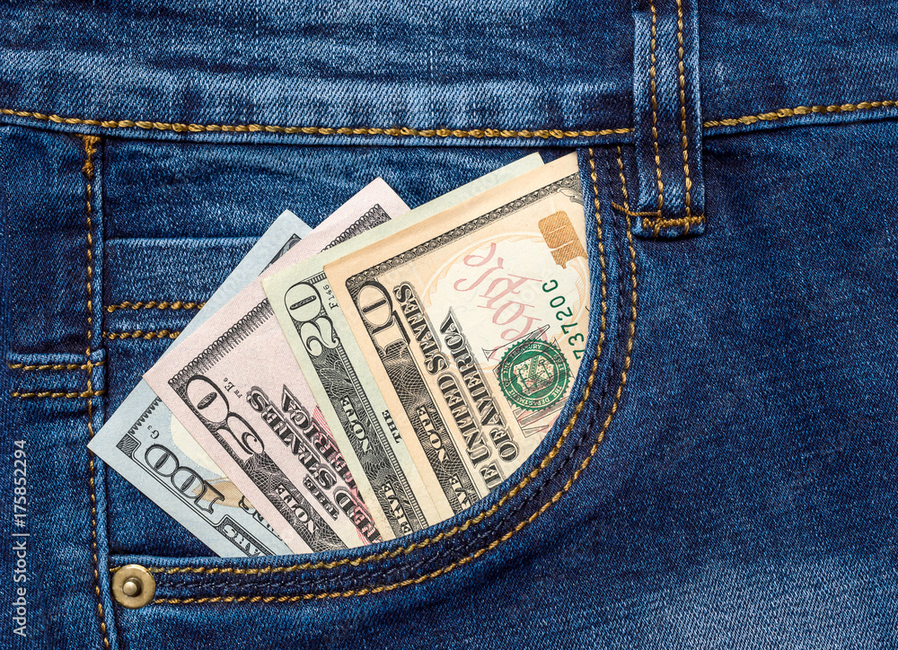 Money in front pocket of jeans. Top view. Money in front pocket of jeans. Top view.