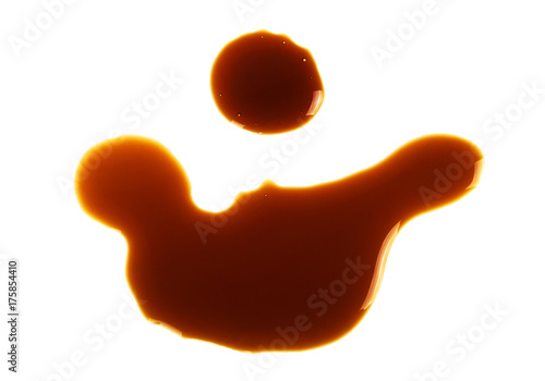 Puddle of soy sauce, white background