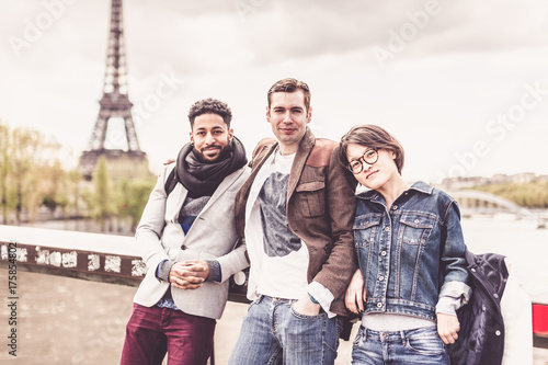 Multi-ethnic Group Of Friends Having Fun In Paris Along Seine