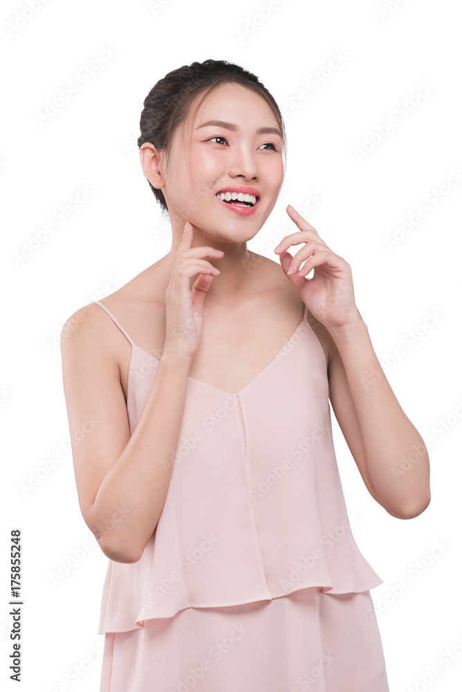 Lovely girl with dark hair and dark eyebrows touching face and looking at camera Lovely girl with dark hair and dark eyebrows touching face and looking at camera