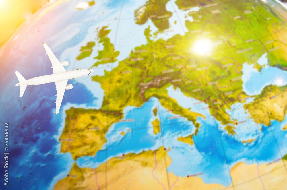 Flight to Europe symbolic image of travel by airplane map.