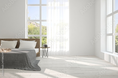 Fototapeta Naklejka Na Ścianę i Meble -  Inspiration of white minimalist  bedroom with summer landscape in window. Scandinavian interior design. 3D illustration