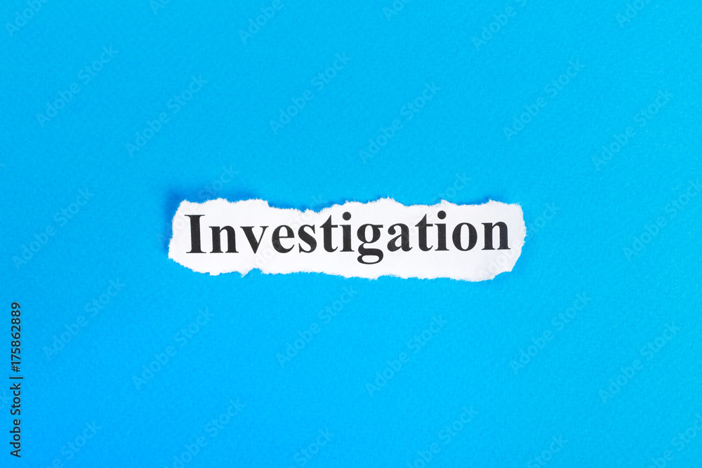 Investigation text on paper. Word Investigation on torn paper. Concept Image Investigation text on paper. Word Investigation on torn paper. Concept Image
