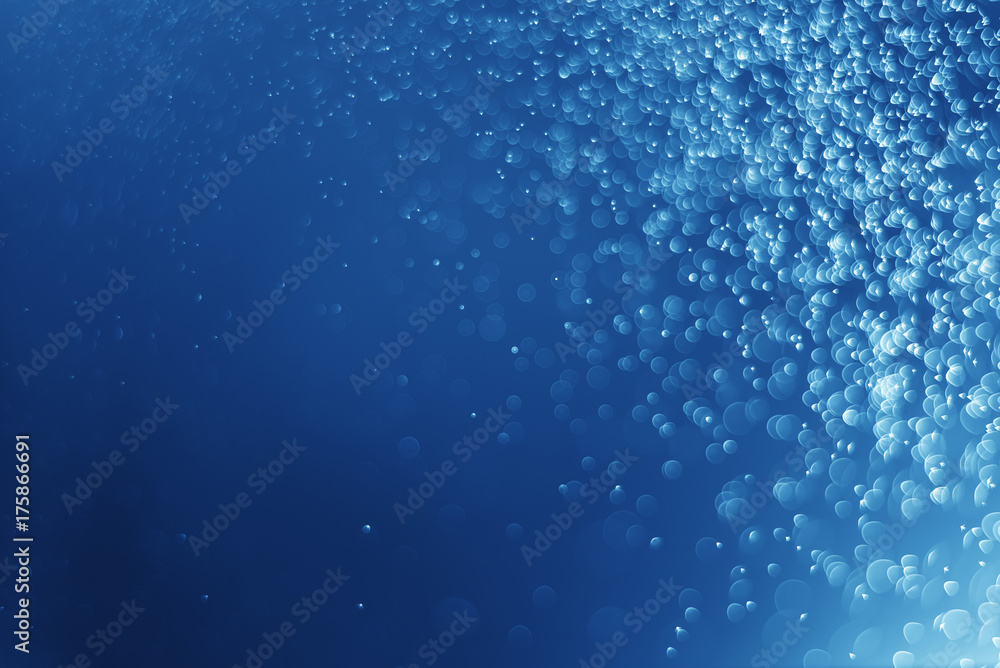 Naklejka premium Glitter light abstract blue bokeh christmas blurred background