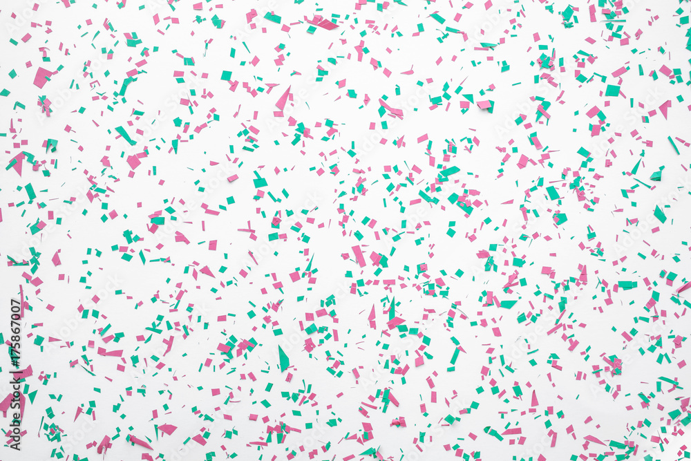 Confetti in christmas decoration color on white background.flat lay