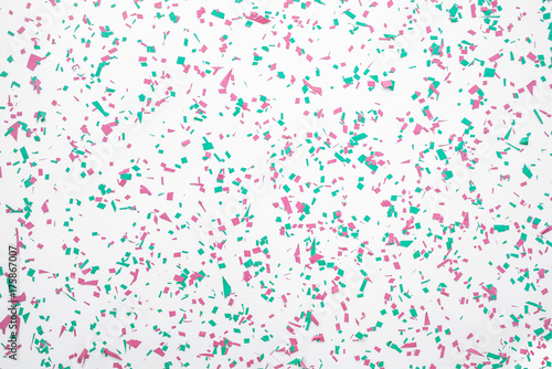Confetti in christmas decoration color on white background.flat lay