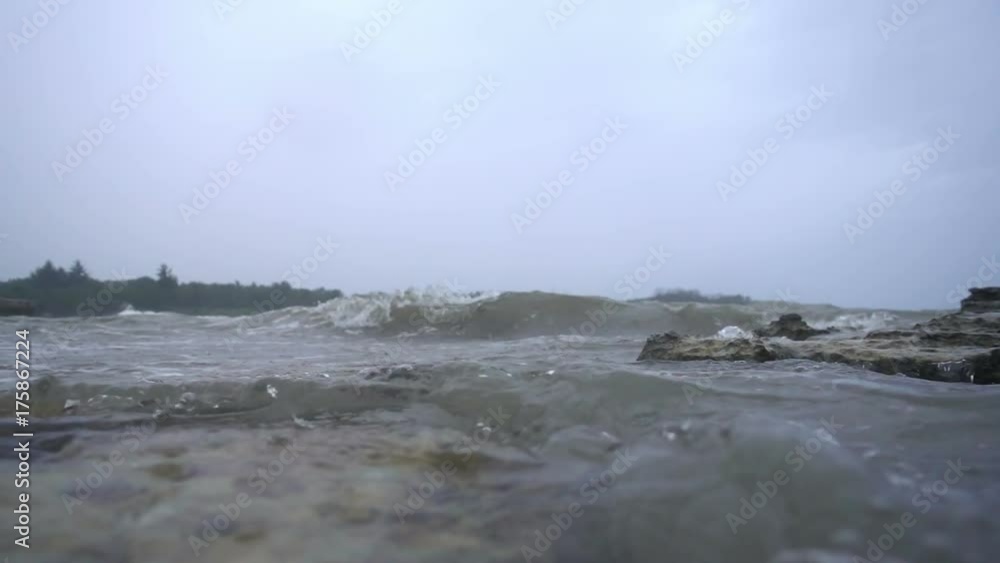 Waves on the ocean. The camera goes under water. Video recorded in slow motion. Waves on the ocean. The camera goes under water. Video recorded in slow motion.