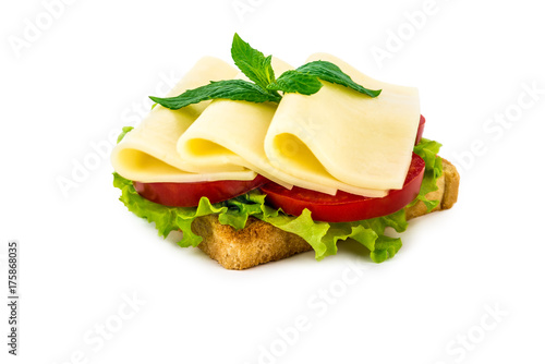 a sandwich with cheese, tomato, salad, on a white isolated background