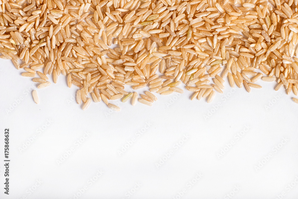 Photography Texture of  brown rice isolated on white background.