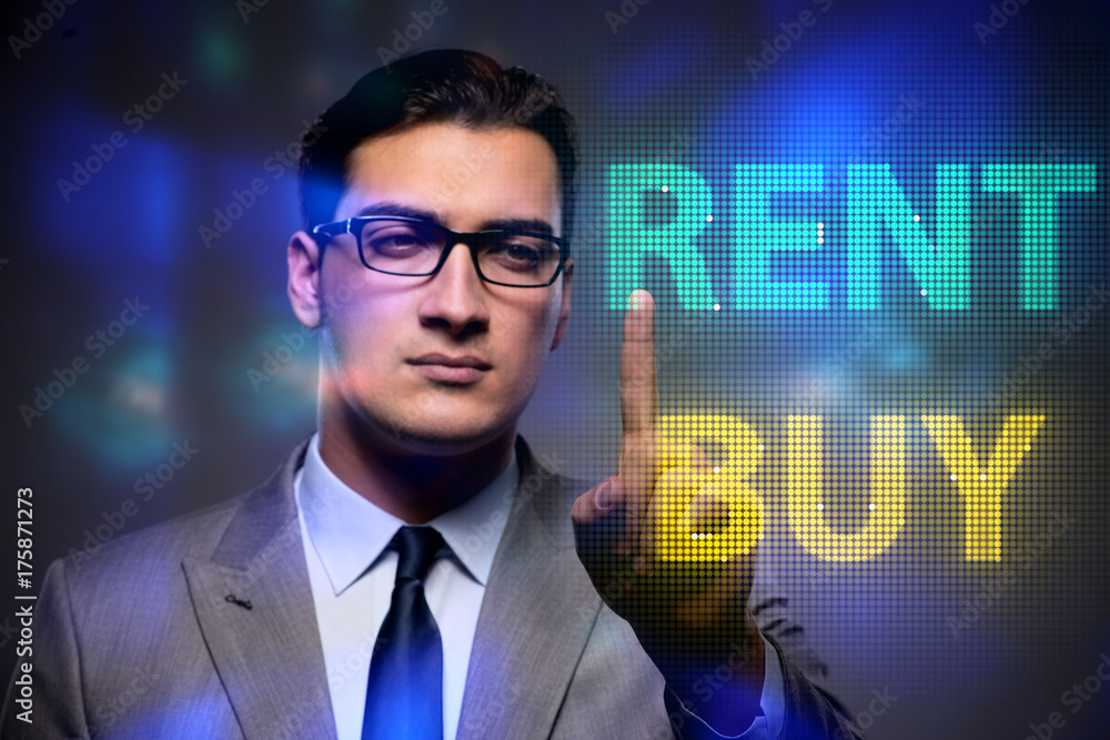 Businessman facing dilemma of buying versus renting Businessman facing dilemma of buying versus renting