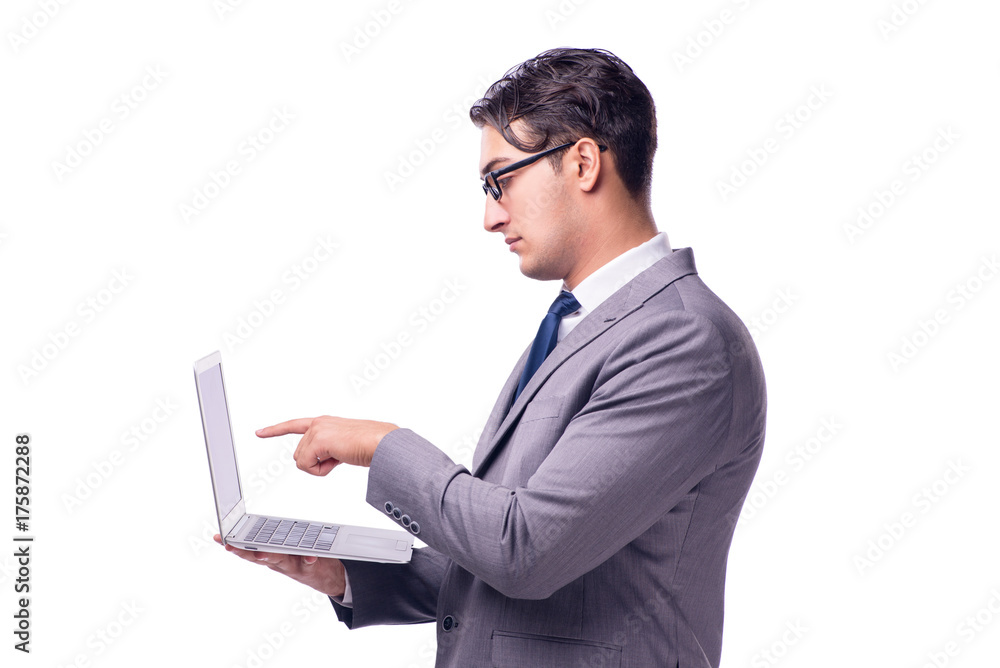 Young businessman working on laptop isolated white Young businessman working on laptop isolated white