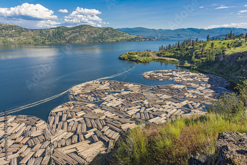 Log Booms on Okanagan Lake with Kelowna British Columbia Canada in the Background