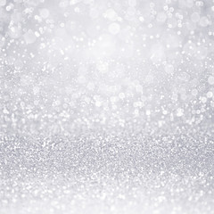 Abstract silver glitter sparkle confetti background for winter Christmas snowfall, 25th anniversary or shiny wedding  or birthday party invitation