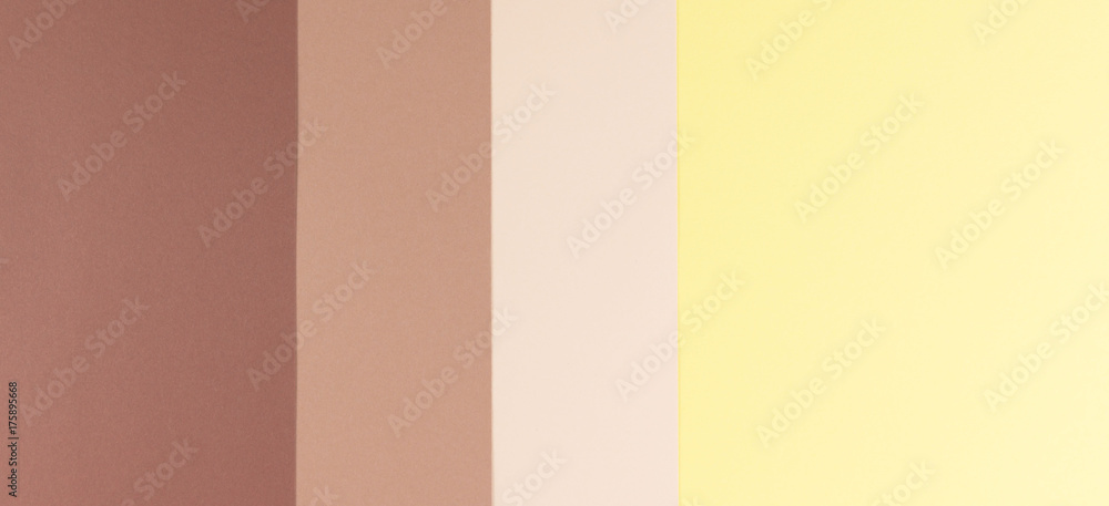 Colorful soft brown, beige and yellow paper background.