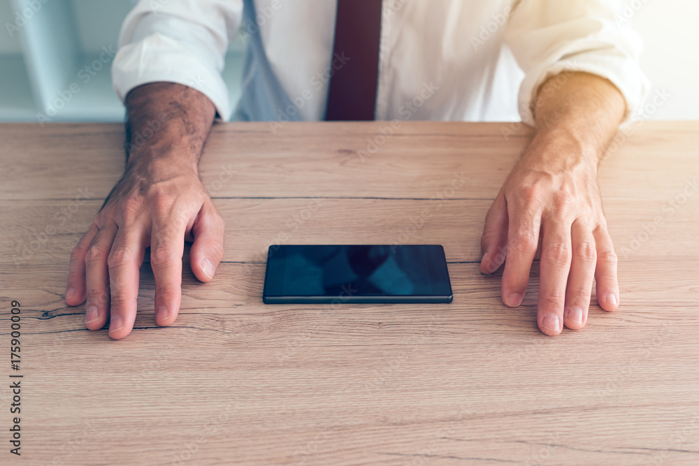 Businessman fighting mobile phone addiction crisis Businessman fighting mobile phone addiction crisis