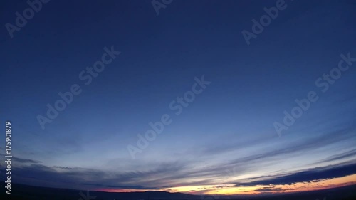 The picturesque landscape on the background of the sunset