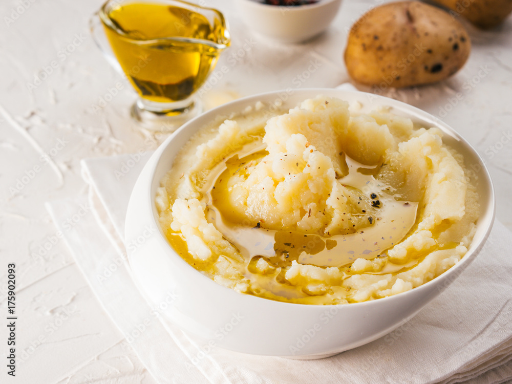 Mashed potatoes on white concrete background Mashed potatoes on white concrete background