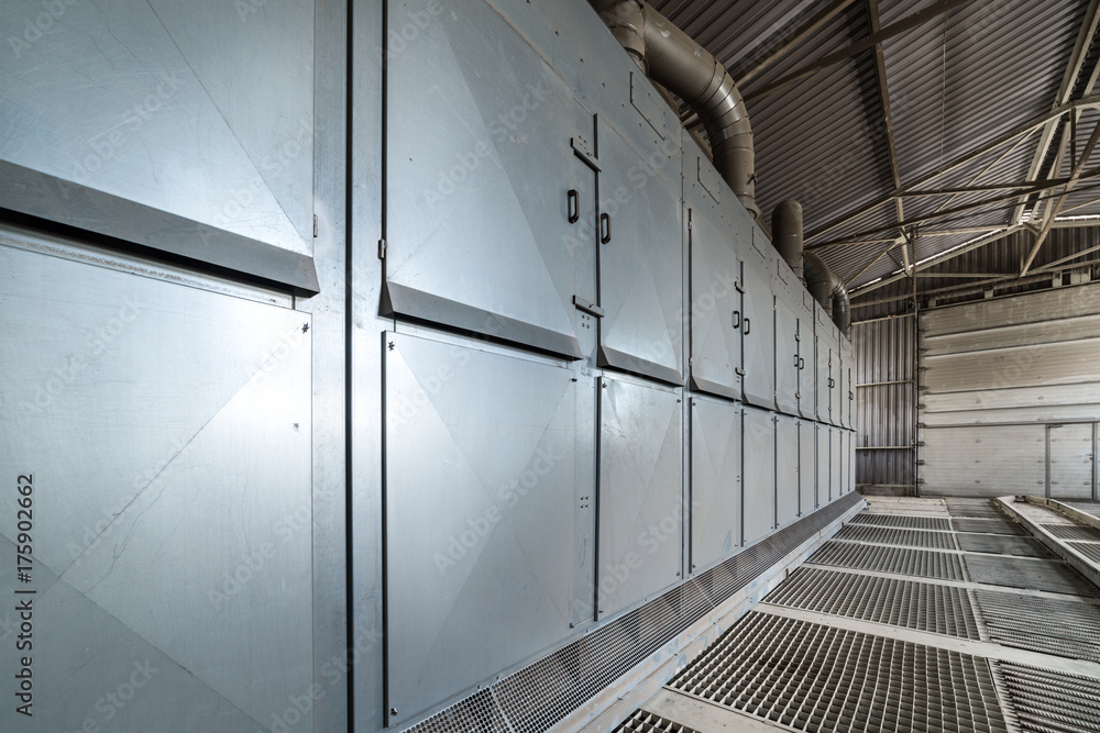 Fototapeta premium Hangar for unloading wheat. Powerful dust extraction system.
