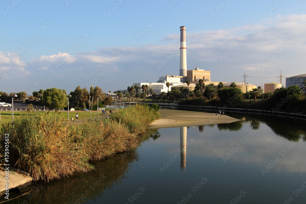 View of the Yarkon river, Reading Power Station, from Bridge in Tel-Aviv, Israel.