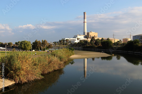 View of the Yarkon river, Reading Power Station, from Bridge in Tel-Aviv, Israel.