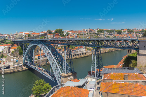 Porto, Portugal, panorama of Dom Luis bridge, the river Douro and tiles roofs 
