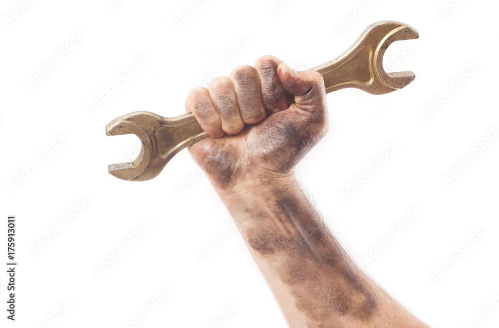 dirty and oily hand holding wrench tool isolated on white