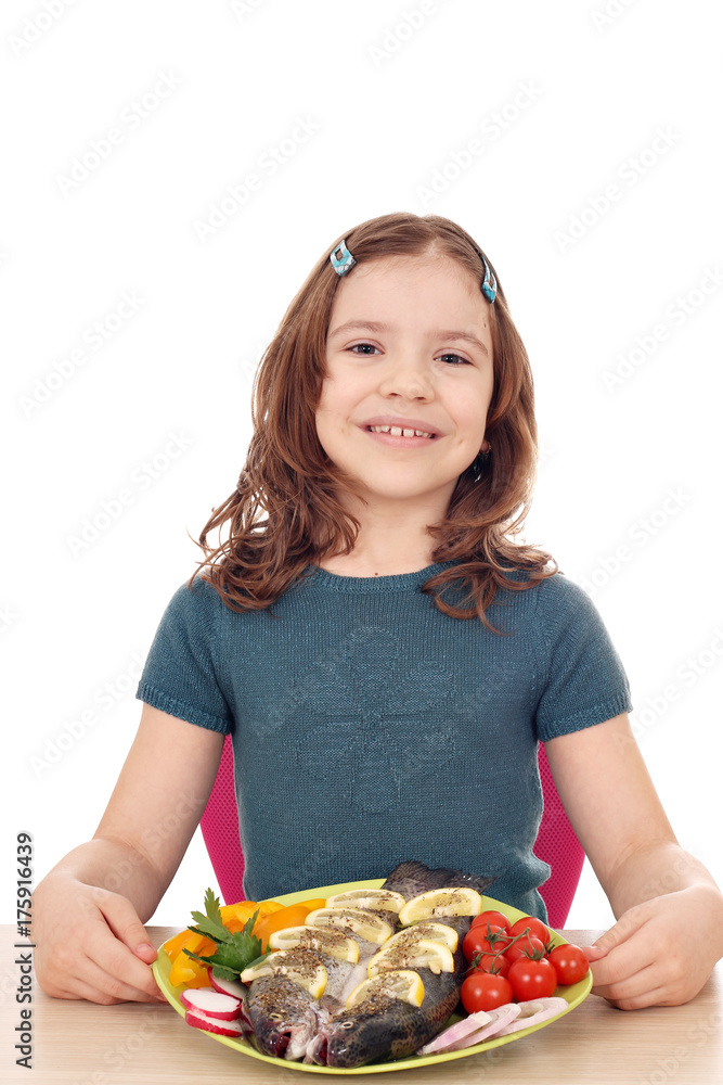 happy little girl with trout fish happy little girl with trout fish