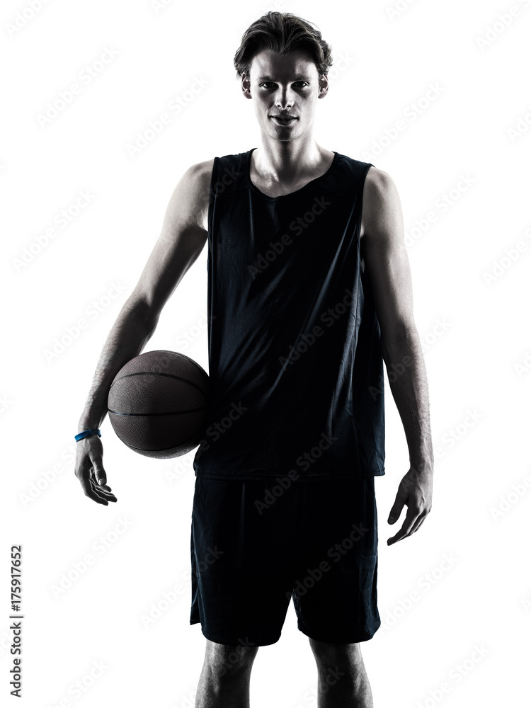 Naklejka premium one caucasian basketball player man isolated in silhouette shadow on white background