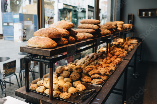 Canvas Print Fresh Bread and Pastries Displayed in Bakery Window in Copenhagen City Center De