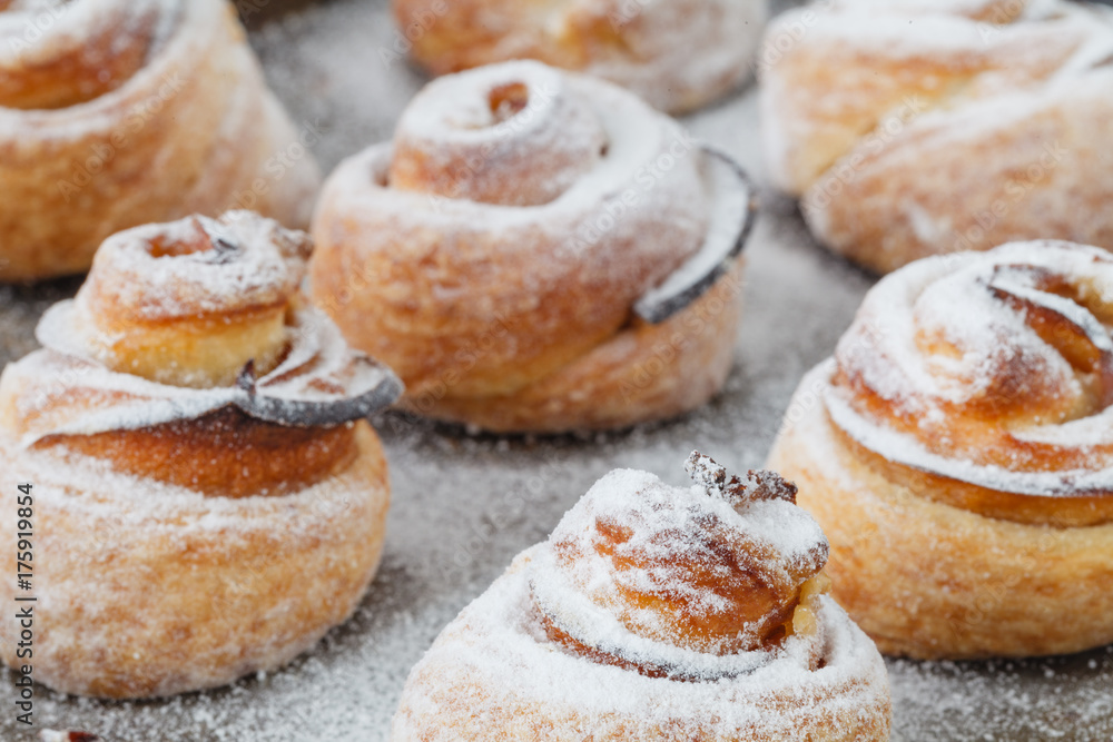 Modern fashionable pastries - scones cruffins (puffmaffin), a mixture of a croissant and maffin