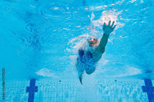 Female swimmer from beneath