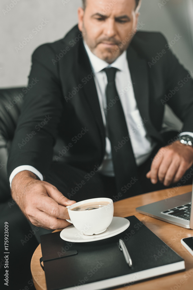 businessman with cup of coffee