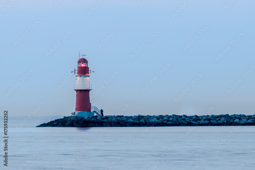 night view of lighthouse of Warnemuende on the Baltic Sea at the
