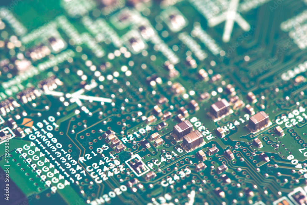 Close up of electronic components on the motherboard, microprocessor chip Close up of electronic components on the motherboard, microprocessor chip